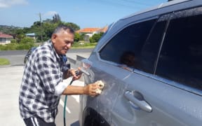 Waitara resident Rex Brunning washes his car more often than usual to get some mysterious yellow droppings off it.