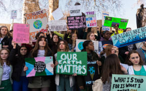 Thousands of young people gather in Parliament Square in central London to protest against the governments lack of action on climate change.