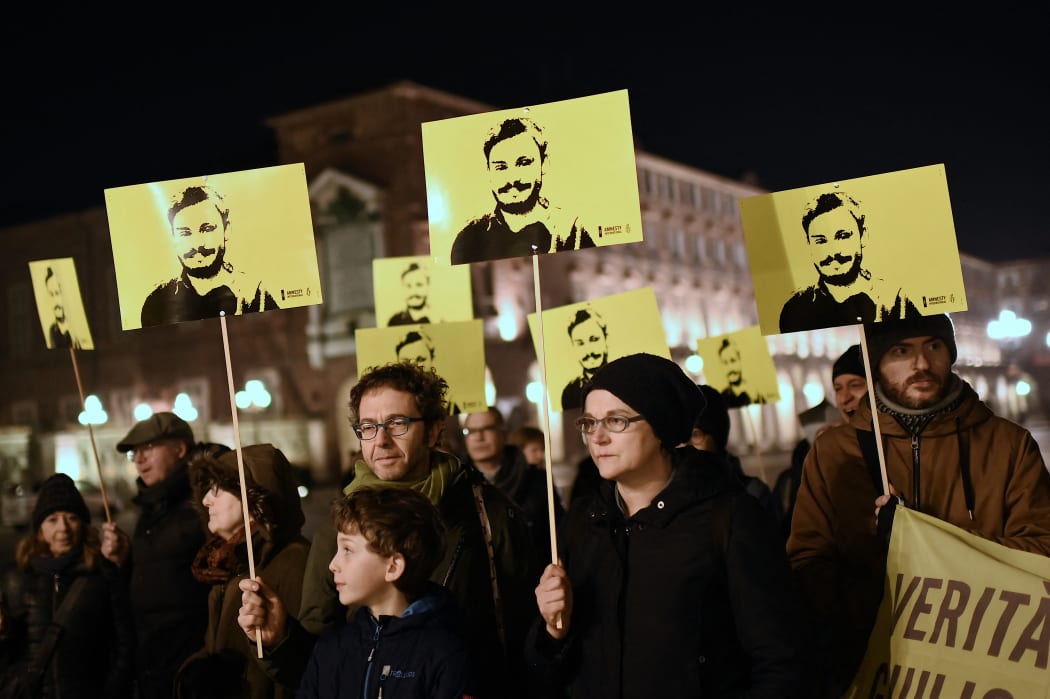 In this file photo taken on January 25, 2020 Activists of human rights organization Amnesty International (AI) take part in a demonstration in Piazza Castello in Turin, to mark the fourth anniversary since the disappearance of Italian student Giulio Regeni.