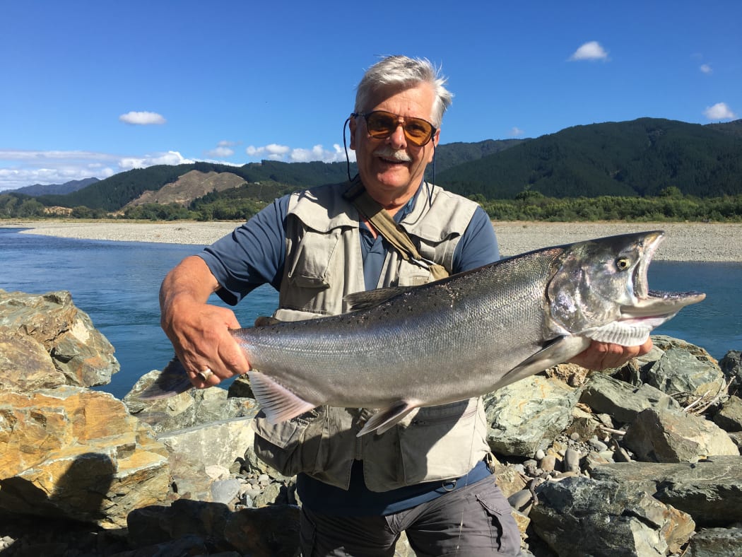 Alex Kole, pictured, landed a quinnat or chinook salmon after help from a passing Marlborough District Council reserves ranger.