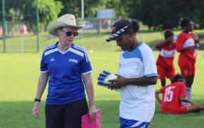 Nicole Demaine on the left at a training session