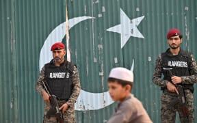 Paramilitary soldiers stand guard outside the Government Health and Educational complex after Indian strikes in Muridke, about 30 kilometres from Lahore.