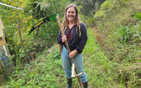 Beth Pearsall in her garden in northern Coromandel