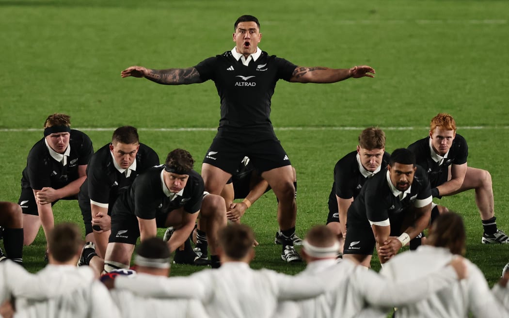 Codie Taylor leads an All Blacks haka against England.