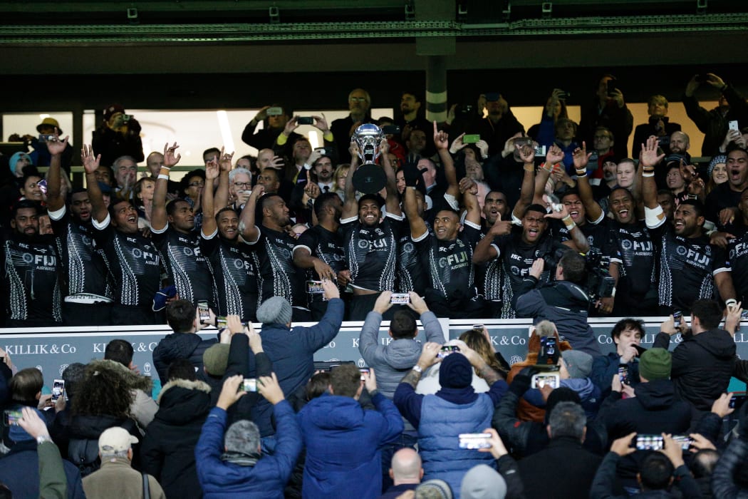 Fiji celebrate winning the Killik Cup after beating the Barbarians.