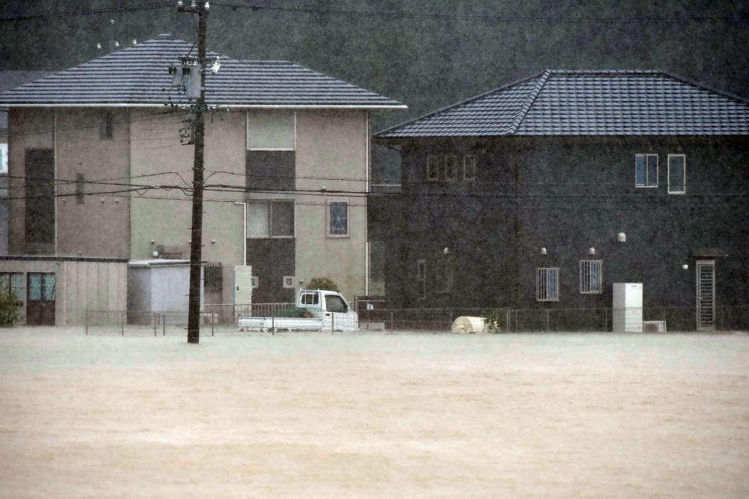Residential area is covered with water in Kushibe Town, Mie prefecture.