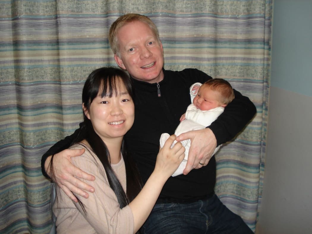 Derek and Wendy Burton with their son William.