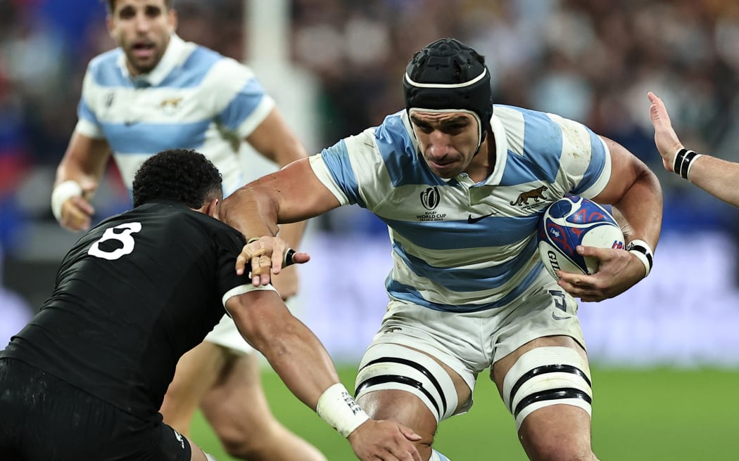 Argentina's lock Tomas Lavanini attempts to break away during the France 2023 Rugby World Cup semi-final match between Argentina and New Zealand at the Stade de France.