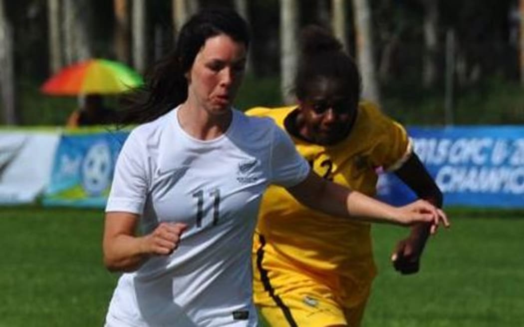 New Zealand's Emma Rolston on her way to one of her nine goals against Vanuatu.
