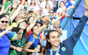 Brazil's Marta interactis with the crowd after her side lost the women's football final to the United States at the Paris Olympics.