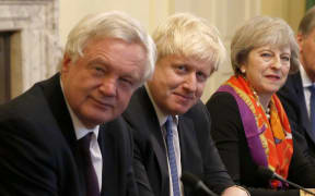 British Prime Minister Theresa May in November 2016 with then-Foreign Secretary Boris Johnson (centre) and Brexit Minister David Davis.