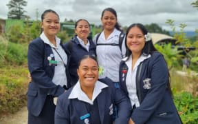 New Plymouth Girls' High School students Lautaimi Sifa, front left, and Teutusi Faoagali, front right, at the Green School.