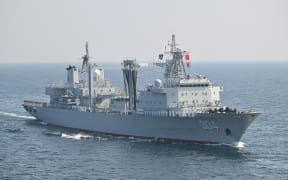 China Navy Ship (NS) Gaoyouhu taking part during the multinational naval exercise AMAN-25 in the Arabian Sea near Pakistan's port city of Karachi on February 10, 2025.