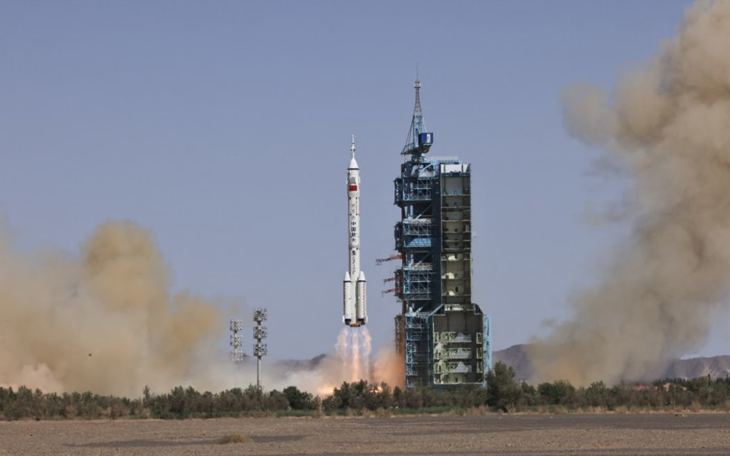 (220605) -- JIUQUAN, June 5, 2022 (Xinhua) -- The crewed spaceship Shenzhou-14, atop a Long March-2F carrier rocket, is launched from the Jiuquan Satellite Launch Center in northwest China, June 5, 2022. (Xinhua/Li Gang) (Photo by LI GANG / XINHUA / Xinhua via AFP)