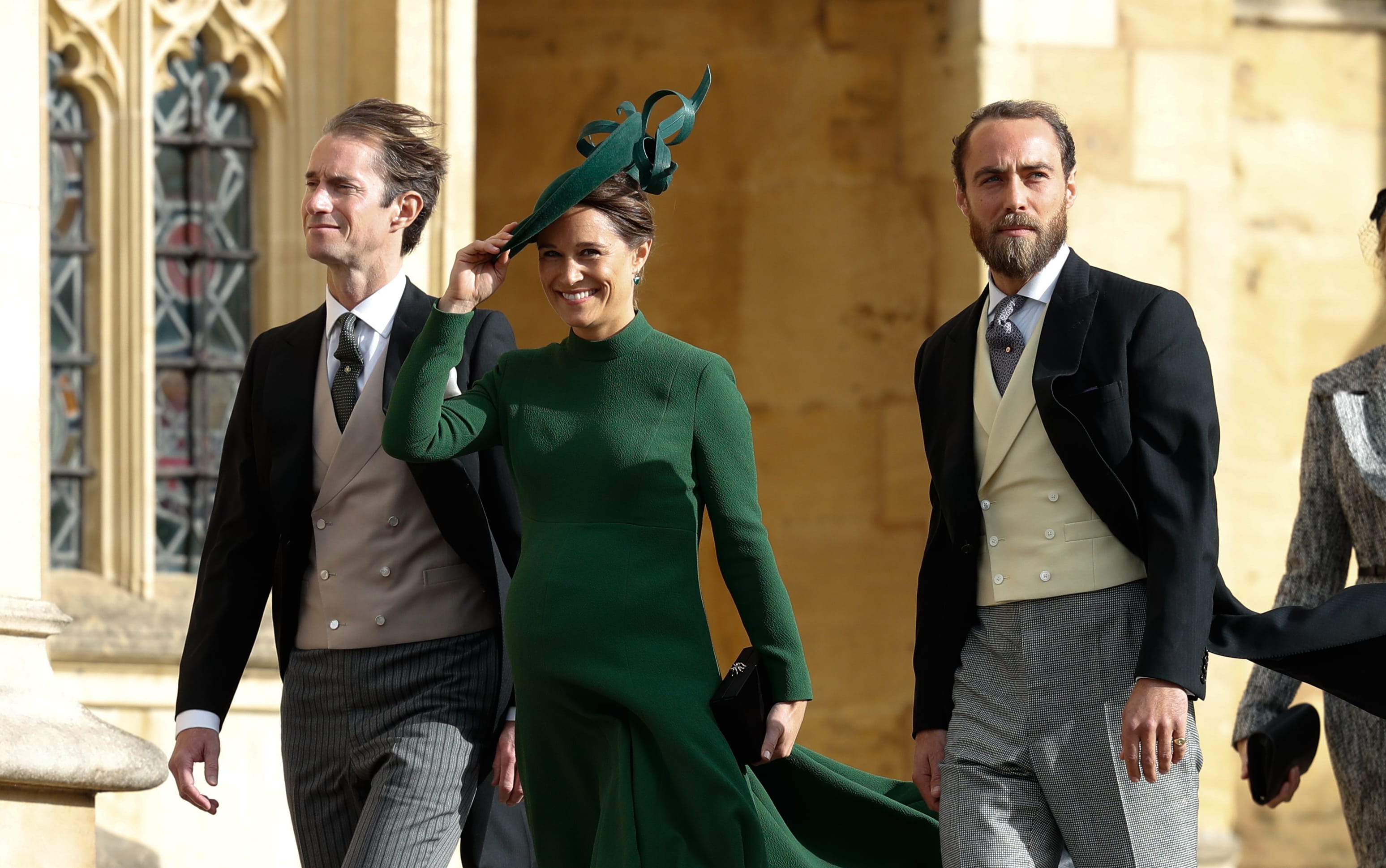 Philippa Matthews Middleton (centre), James Middleton (right), and Pippa's husband James Matthews (left) arrive to attend the wedding of Britain's Princess Eugenie.
