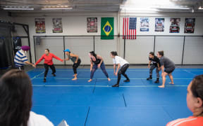 Members of the New Zealand Women's Kabaddi team training in a gym in Manukau, Auckland.