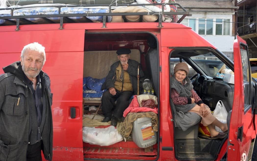 Armenian refugees from Nagorno-Karabakh are seen in the center of the town of Goris on September 30, 2023 before being evacuated in various Armenian cities.