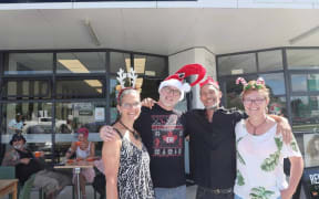 The doors were open at Reload Cafe in Leamington, Cambridge, but owner Jody Joblin, right, wasn’t planning to sell anything. She’s pictured with, from left, Paula Baxter, Garrit Van Dijk, and Joel Retimana.