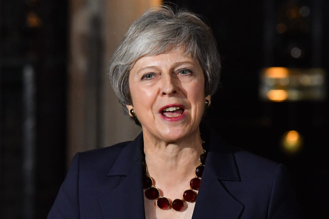 The British prime minister, Theresa May says her Cabinet has agreed the government should accept a draft treaty on Britain's departure from the European Union.