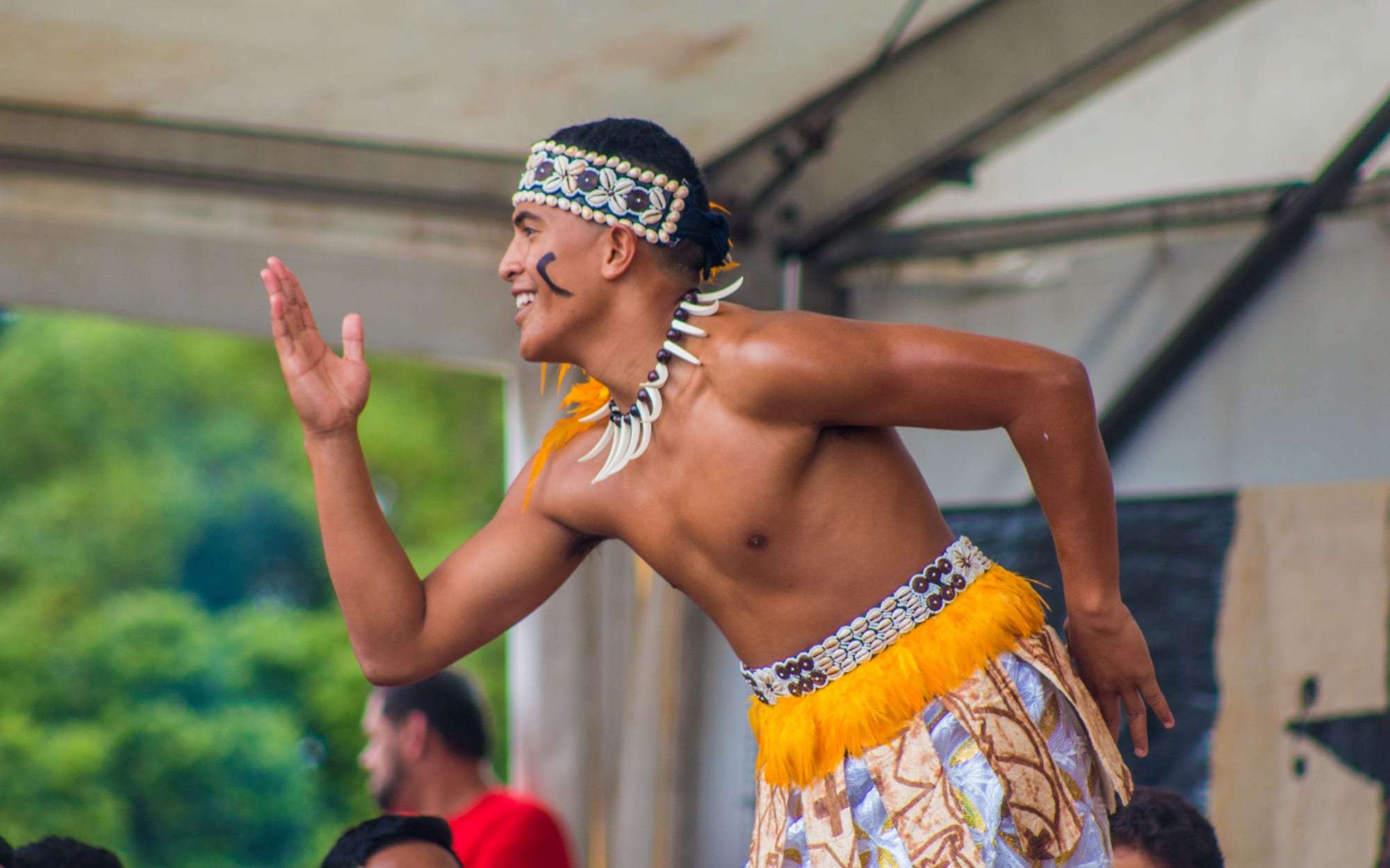 AJ Tuipea performs as the Fuataimi for St Paul's College at Polyfest 2018