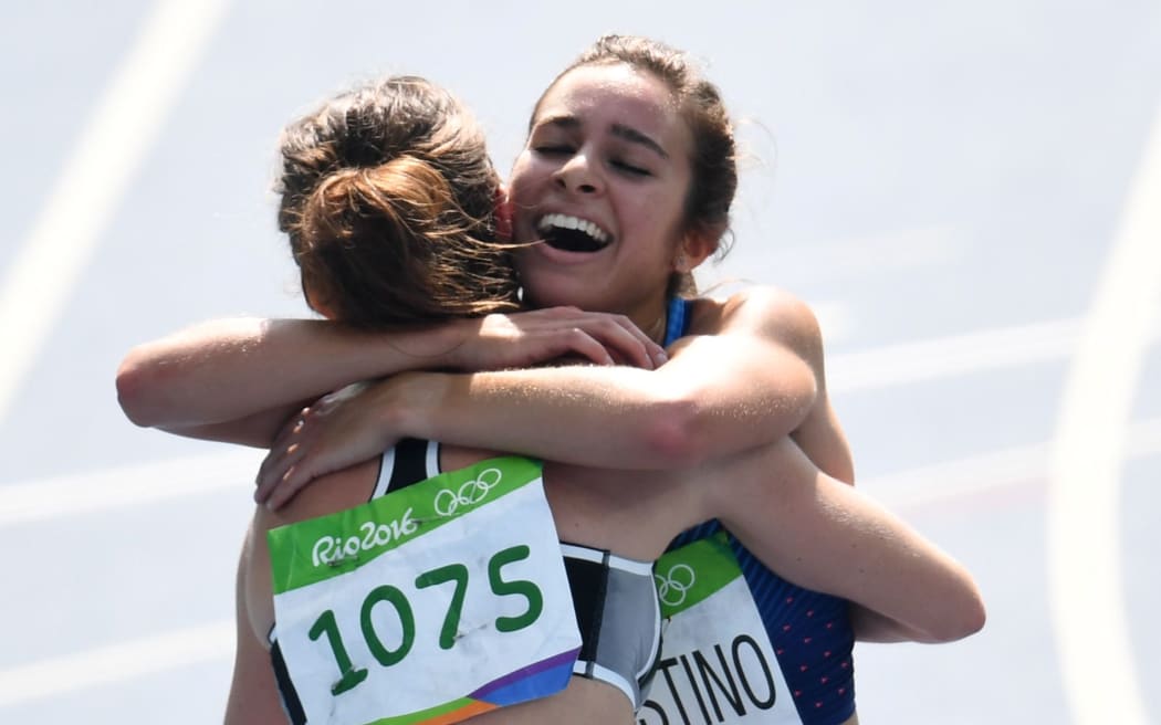 Nikki Hamblin, left, and Abbey D'Agostino after the 5000m Round 1 race.