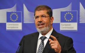 Former Egyptian President Mohamed Morsi speaking in Brussels in 2012.