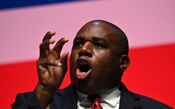 Britain's main opposition Labour Party Shadow Foreign Secretary David Lammy addresses delegates on the second day of the annual Labour Party conference in Liverpool, northwest England, on October 9, 2023. (Photo by Paul ELLIS / AFP)
