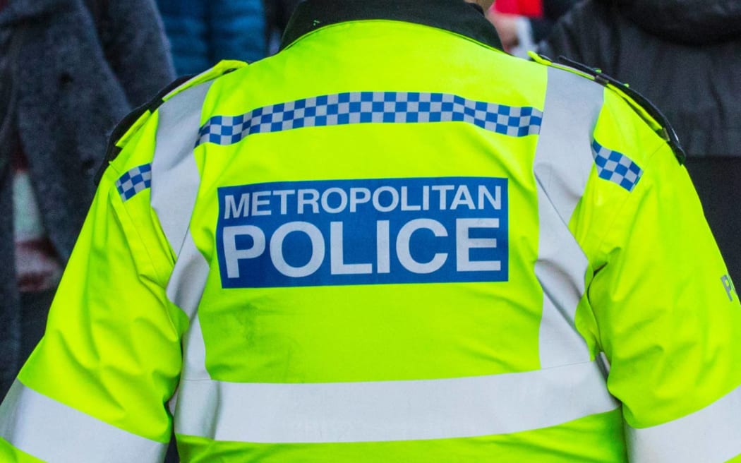A Met Police officer.