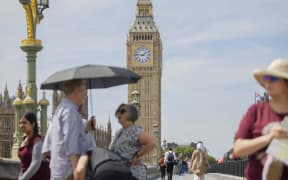 LONDON, UNITED KINGDOM - JUNE 16: A general view of the city where people are set for a scorching end to the week as temperatures are expected to reach highs of 35 degrees in London, United Kingdom on June 16, 2022. It has been reported that the southeast and east of the country, including the capital London, are under a heatwave. While the air temperature that has scorched the country since Wednesday is expected to reach 35 degrees tomorrow, the hot weather will lose its effect with rain on Sunday. Rasid Necati Aslim / Anadolu Agency (Photo by Rasid Necati Aslim / ANADOLU AGENCY / Anadolu Agency via AFP)