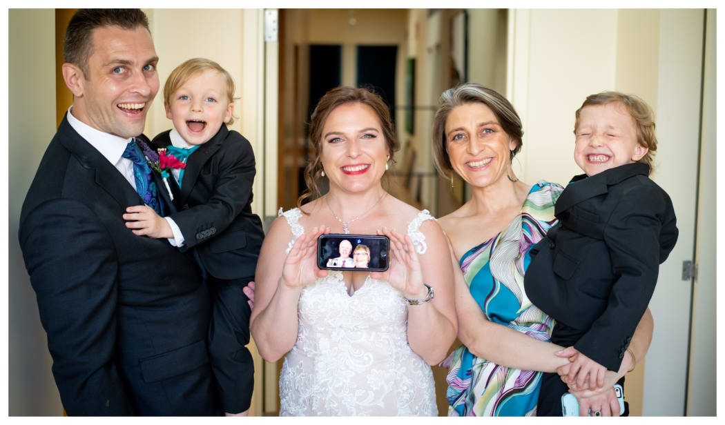 Helen Ellis and husband Clive on zoom to son's Chicago wedding