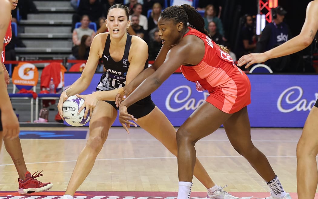 Silver Ferns Amelia Walmsley (L) with England's Halimat Adio