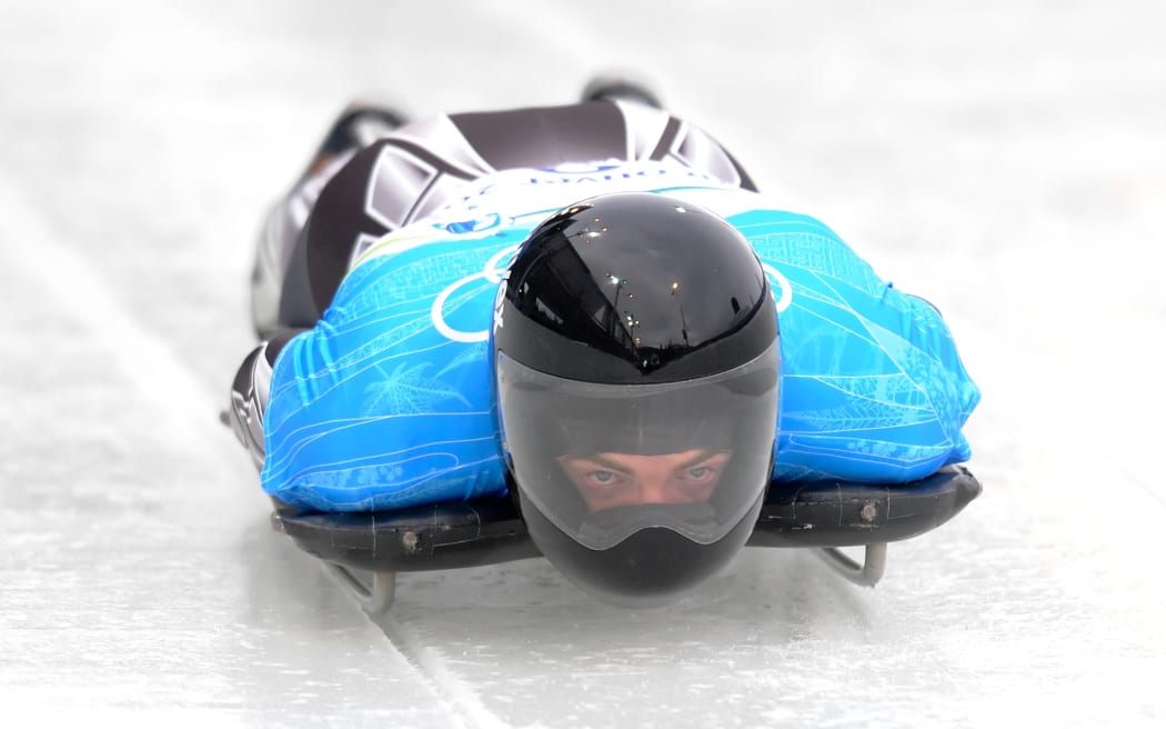 Ben Sandford of New Zealand begins his first run of the men's skeleton training heats at the Whistler Sliding Centre on February 15, 2010 during the Vancouver Winter Olympics. AFP PHOTO / Leon Neal (Photo by LEON NEAL / AFP)