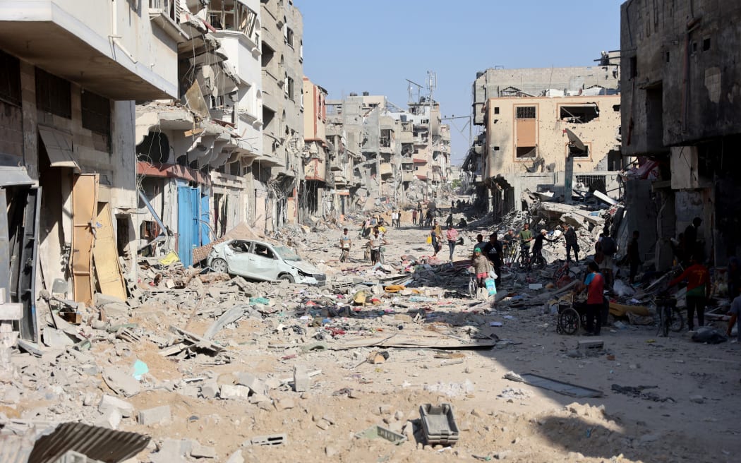 A view of the destroyed buildings and rubble after the Israeli military withdrew from the Shujaiya neighbourhood, east of Gaza City on July 10, 2024, amid the ongoing conflict between Israel and the militant Hamas group. Israel's army dropped thousands of leaflets over war-torn Gaza City on July 10, urging all residents to flee a heavy offensive through the main city of the besieged Palestinian territory.