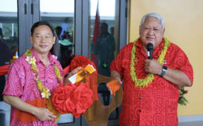 The ambassador of the People’s Republic of China, Chao Xiaoliang hands over the key for the Multi-Sport Centre to Samoa Prime Minister Tuilaepa at the handover ceremony on 20 June 2019.