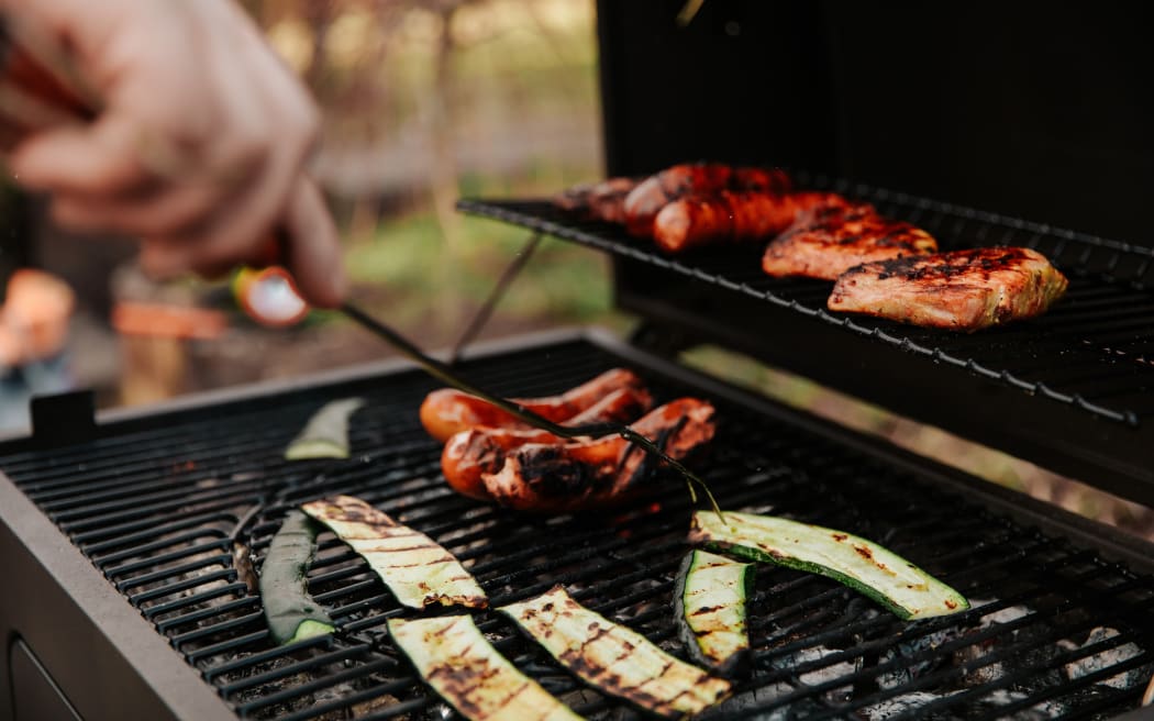 Barbecued courgettes and sausages.