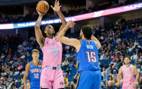 The Breakers Freddie Gillespie #33 shoots over the Thunder's Alex Reese #15 on October 10, 2024 in Tulsa, Oklahoma.