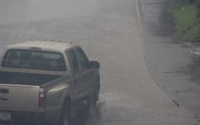 Heavy rain starts in American Samoa as Tropical Cyclone Amos approaches.