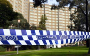Police tape blocks an entrance at a public housing estate which is undergoing a forced lockdown in Melbourne on July 10, 2020, as the city records another 288 new cases in a fresh outbreak of the COVID-19 coronavirus. Australia will slash the number of returning citizens allowed into the country by half as it struggles to contain an outbreak of coronavirus in its second-largest city, officials announced on July 10. (Photo by William WEST / AFP)