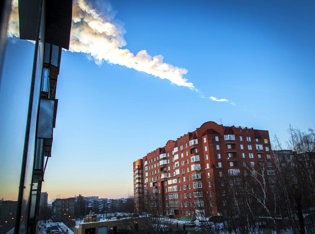 An asteroid explodes above the Russian city of Chelyabinsk, on 15 February, 2013.