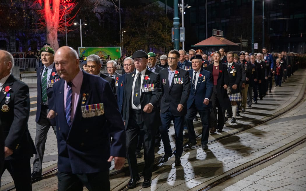 Returned servicemen march at the Christchurch dawn service