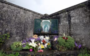A shrine in Tuam, County Galway, erected in memory of up to 800 children who were buried at the site of the former home for unmarried mothers, run by nuns.