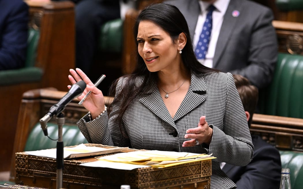 Britain's Home Secretary Priti Patel making a statement on the Government's Migration and Economic Development Partnership with Rwanda, in the House of Commons, in London, on 15 June 2022. 
AFP / Jessica Taylor / UK Parliament