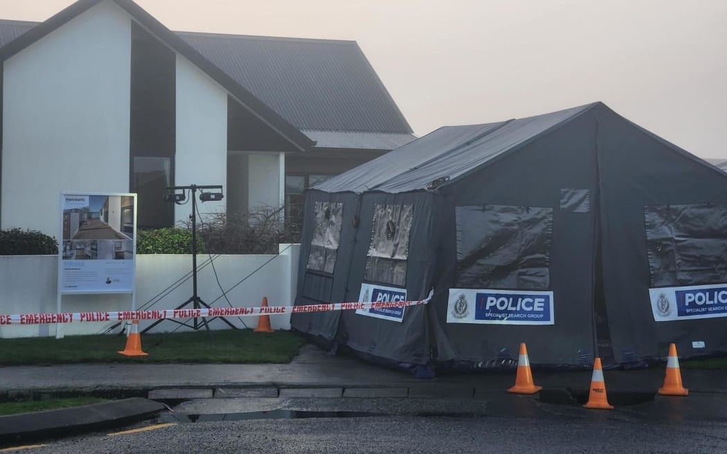 A tent was put up outside a house at Trevor Street, Hornby, where police investigating the disappearance of Yanfei Bao have been carrying out a search.