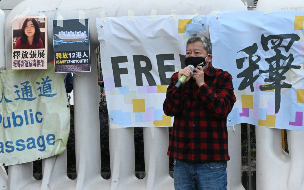 An activist in Hong Kong during a protest calling on China to free a group of Hong Kong democracy activists and as Chinese citizen journalist Zhan Zhang, on 28 December, 2020.