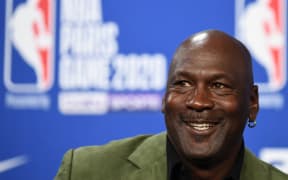 A pair of sneakers worn by NBA superstar Michael Jordan early in his career sold for nearly $1.5 million on October 24, 2021, setting a record price at auction for game-worn footwear, Sotheby's said.