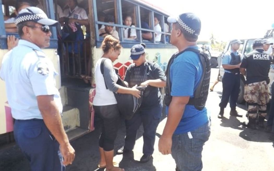 Police search bags of college students in Apia