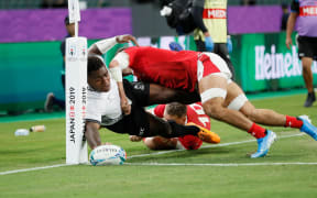 Josua Tuisova scores the opening try of the match.