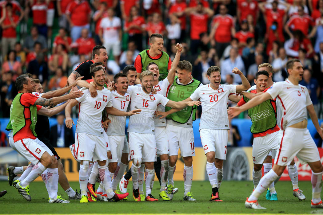 Poland celebrates its win against Switzerland on penalties in round of 16 of Euro 16.