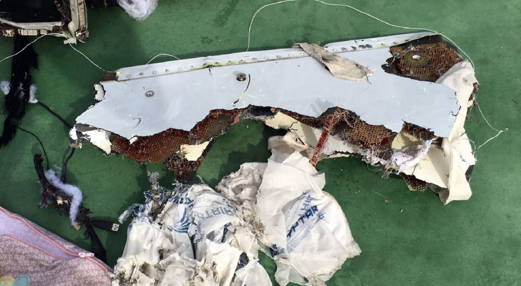 A picture uploaded on the official Facebook page of the Egyptian military spokesperson on May 21, 2016 and taken from an undisclosed location reportedly shows some debris that the search teams found in the sea after the EgyptAir Airbus A320 crashed in the Mediterranean.