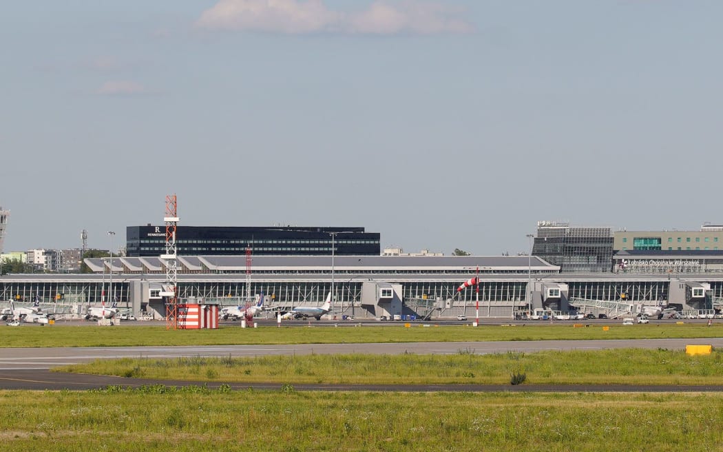Terminals and a runway are seen at Chopin International Airport in July 2020, in Warsaw, Poland. Polish authorities have closed Warsaw International Airport, and Polish and NATO aircraft have been scrambled as reports have surfaced of Russian drones over the country.